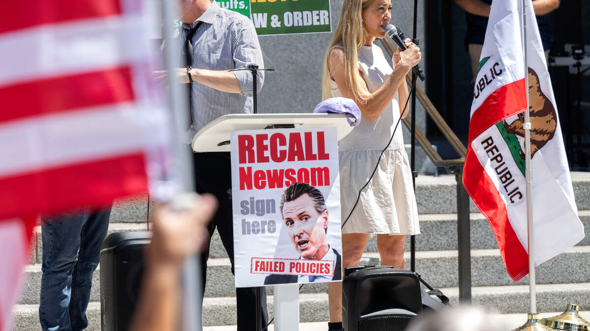 Elaine Culotti, former host of the reality television series “Undercover Billionaire”, speaks to a group of supporters gathered on the west steps of the Capitol on Sunday, Aug. 3, 2025 to gain support for a recall of Gov. Gavin Newsom.